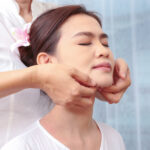 close-up-of-thai-massage-face-stretching-spa-concept